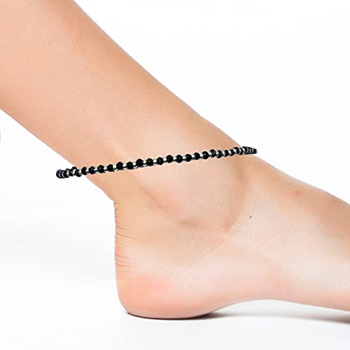 925 Sterling Silver Nazariya Anklet with elegant Black & Silver Crystal Beads, designed for girls and women. This adjustable anklet is comfortable, stylish, and perfect for everyday wear or special occasions. Made with high-quality sterling silver, the anklet is a beautiful combination of tradition and modern fashion, ideal for adding a unique touch to your jewelry collection. A great gift idea for loved ones, designed to suit all occasions, from casual outings to festive celebrations.