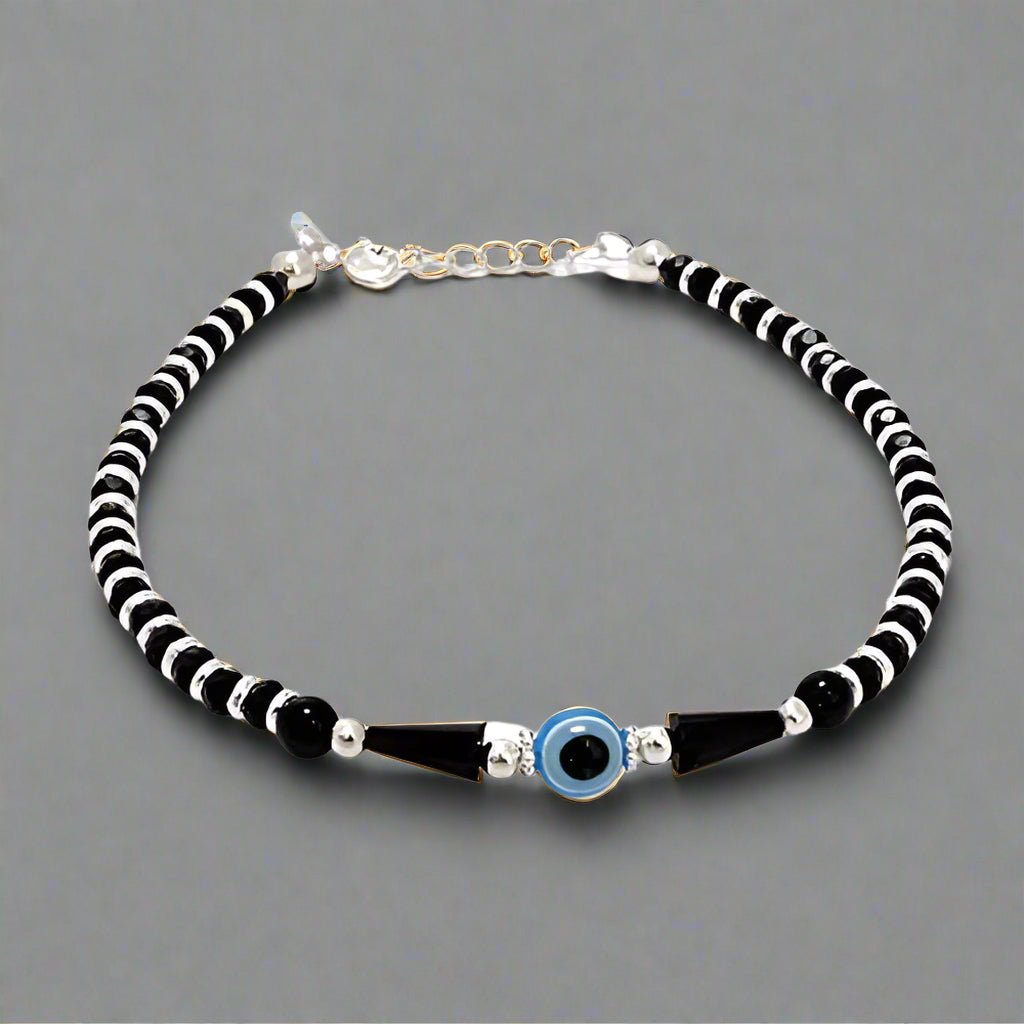 This 92.5 Sterling Silver Evil Eye Bracelet for men and women features a stylish, adjustable Nazariya Ankh wala design. Made from pure Chandi (silver), this handcrafted bracelet is believed to offer protection from the evil eye (Buri Nazar) and serves as a traditional Najar Battu. The elegant silver bracelet is perfect for daily wear and is ideal for anyone seeking both fashion and spiritual safeguarding from negative energies.