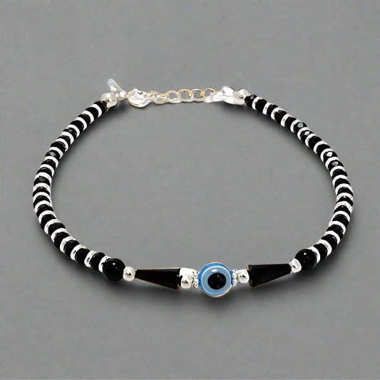 This 92.5 Sterling Silver Evil Eye Bracelet for men and women features a stylish, adjustable Nazariya Ankh wala design. Made from pure Chandi (silver), this handcrafted bracelet is believed to offer protection from the evil eye (Buri Nazar) and serves as a traditional Najar Battu. The elegant silver bracelet is perfect for daily wear and is ideal for anyone seeking both fashion and spiritual safeguarding from negative energies.