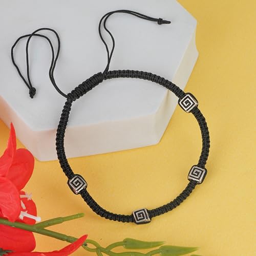 Handcrafted 925 sterling silver black thread anklet featuring 4 spiral square beads, designed for women and girls. This elegant and stylish anklet combines traditional and modern elements, with adjustable black thread for a perfect fit. Made from pure silver, it is a versatile accessory ideal for both casual and formal wear. Perfect gift for any occasion, symbolizing beauty and grace with its intricate craftsmanship.