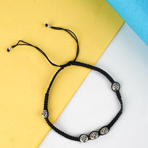 925 sterling silver black thread anklet with 5 round flower beads for women and girls. This handcrafted pure silver anklet features a stylish and adjustable black thread, blending traditional charm with modern design. The delicate flower beads add a touch of elegance, making it perfect for daily wear or special occasions.