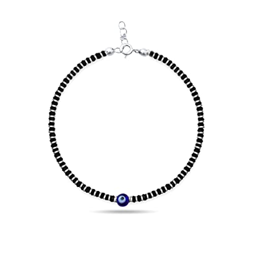 A beautiful 925 sterling silver black thread anklet featuring a protective evil eye charm, accented with a combination of black and silver beads. This stylish and adjustable anklet is perfect for girls and women, offering both comfort and elegance. Ideal for daily wear or special occasions, the anklet combines the timeless appeal of sterling silver with the fashionable touch of black thread and beads, making it a perfect accessory for any outfit.