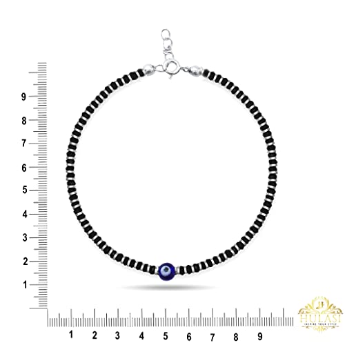 A beautiful 925 sterling silver black thread anklet featuring a protective evil eye charm, accented with a combination of black and silver beads. This stylish and adjustable anklet is perfect for girls and women, offering both comfort and elegance. Ideal for daily wear or special occasions, the anklet combines the timeless appeal of sterling silver with the fashionable touch of black thread and beads, making it a perfect accessory for any outfit.