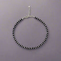 925 Sterling Silver Nazariya Anklet with elegant Black & Silver Crystal Beads, designed for girls and women. This adjustable anklet is comfortable, stylish, and perfect for everyday wear or special occasions. Made with high-quality sterling silver, the anklet is a beautiful combination of tradition and modern fashion, ideal for adding a unique touch to your jewelry collection. A great gift idea for loved ones, designed to suit all occasions, from casual outings to festive celebrations.