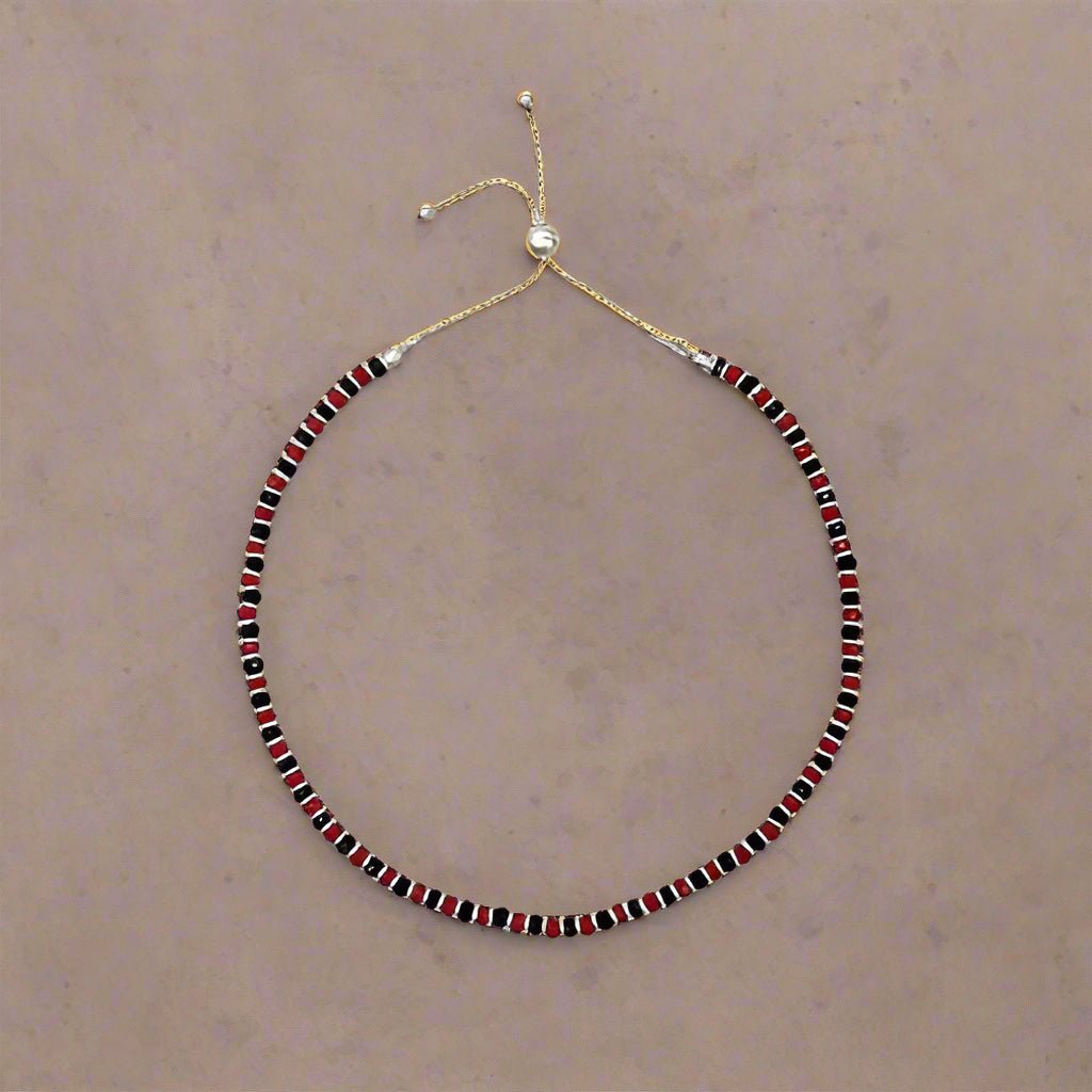 925 Sterling Silver Nazariya Anklet featuring a combination of black, silver, and red beads, designed for girls and women. This adjustable anklet is not only stylish but also comfortable for everyday wear. Ideal for adding a touch of elegance and charm, this anklet is perfect for pooja rituals or as a thoughtful gift. Made with high-quality 925 sterling silver, ensuring durability and long-lasting shine.