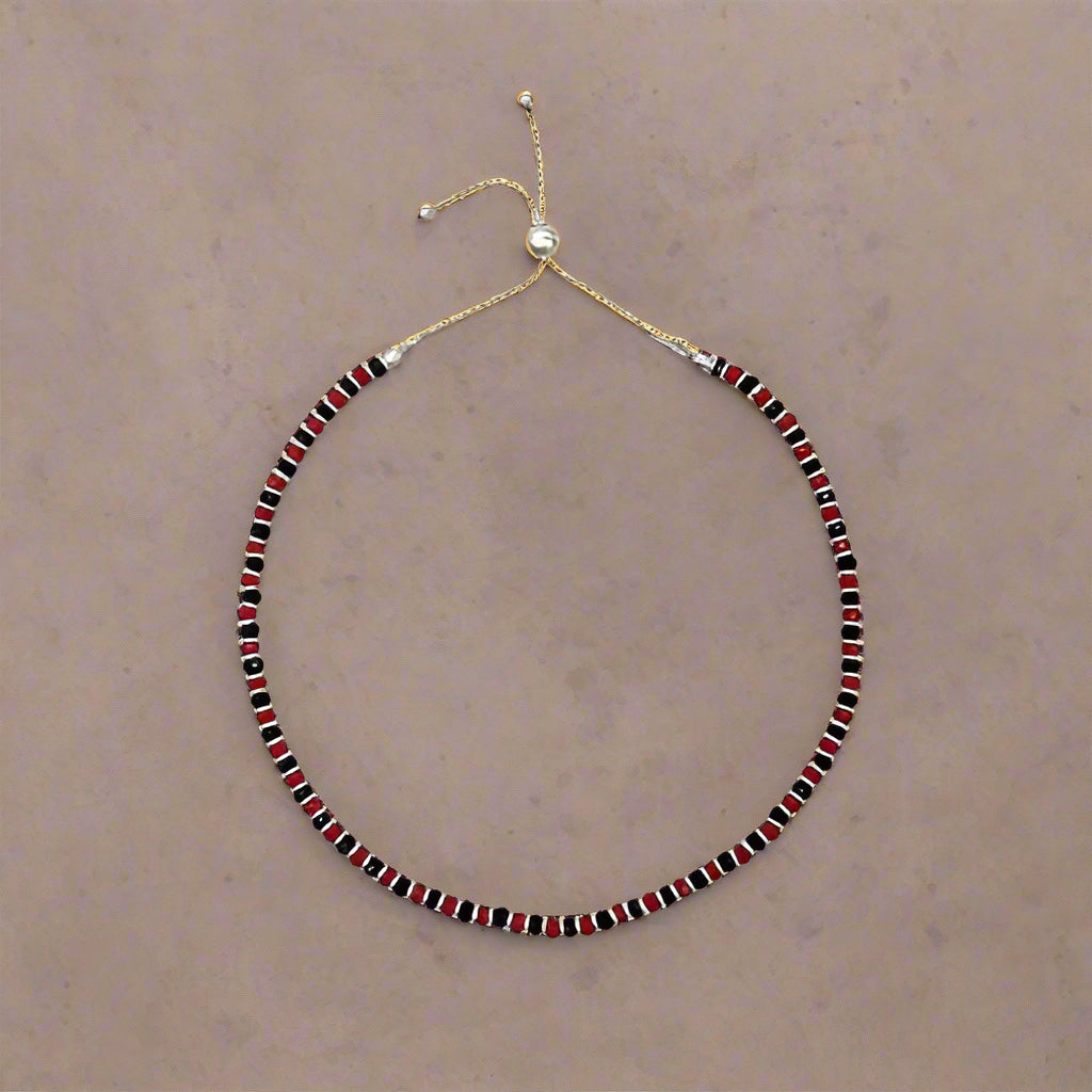 925 Sterling Silver Nazariya Anklet featuring a combination of black, silver, and red beads, designed for girls and women. This adjustable anklet is not only stylish but also comfortable for everyday wear. Ideal for adding a touch of elegance and charm, this anklet is perfect for pooja rituals or as a thoughtful gift. Made with high-quality 925 sterling silver, ensuring durability and long-lasting shine.