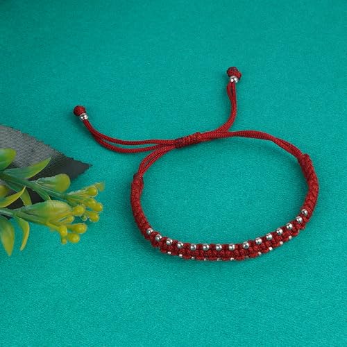 925 Sterling Silver Red Thread Anklet with 30 Ball Beads for Women and Girls. This handcrafted anklet features a unique blend of traditional and modern design, with adjustable black thread and 30 pure silver ball beads, offering a comfortable and stylish fit for all occasions. The anklet is made from high-quality sterling silver, ensuring durability and a luxurious look. Perfect for casual wear, festivals, or as a gift for loved ones.