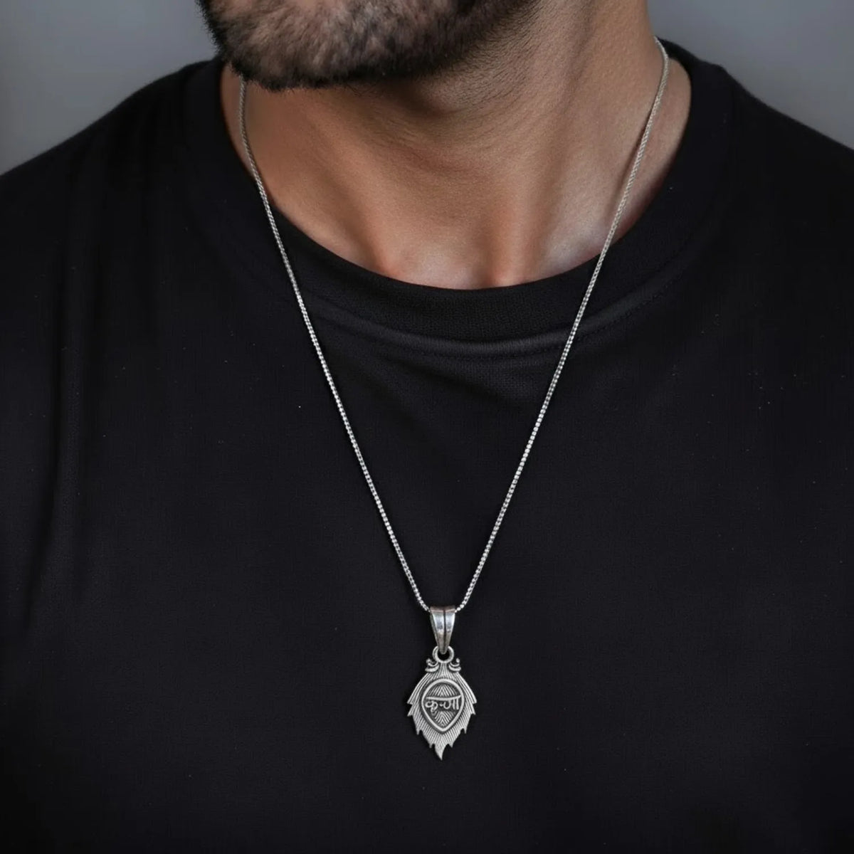 Krishna Feather Oxidised Silver Pendant