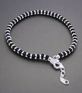 Nazariya bracelet for women crafted from 92.5% pure sterling silver, featuring black crystals. This elegant bracelet is 7 inches long with an extension for a perfect fit, designed to bring style and comfort. A beautiful and meaningful accessory, ideal for those seeking a unique and fashionable piece of jewelry with a protective charm.